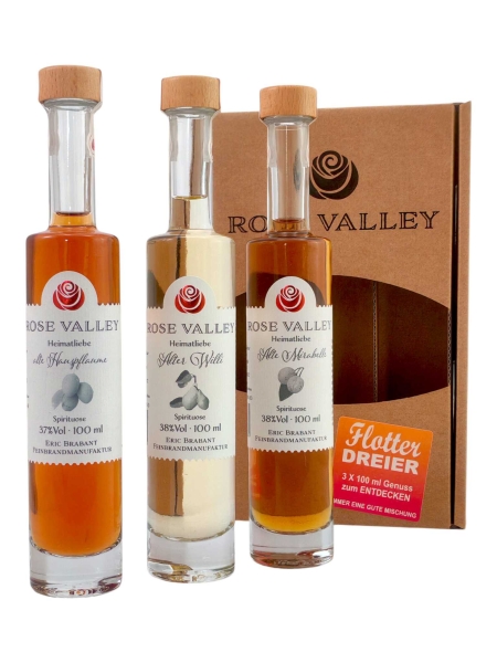 3 Flaschen 100ml Rose Valley vor der Verpackung stehend